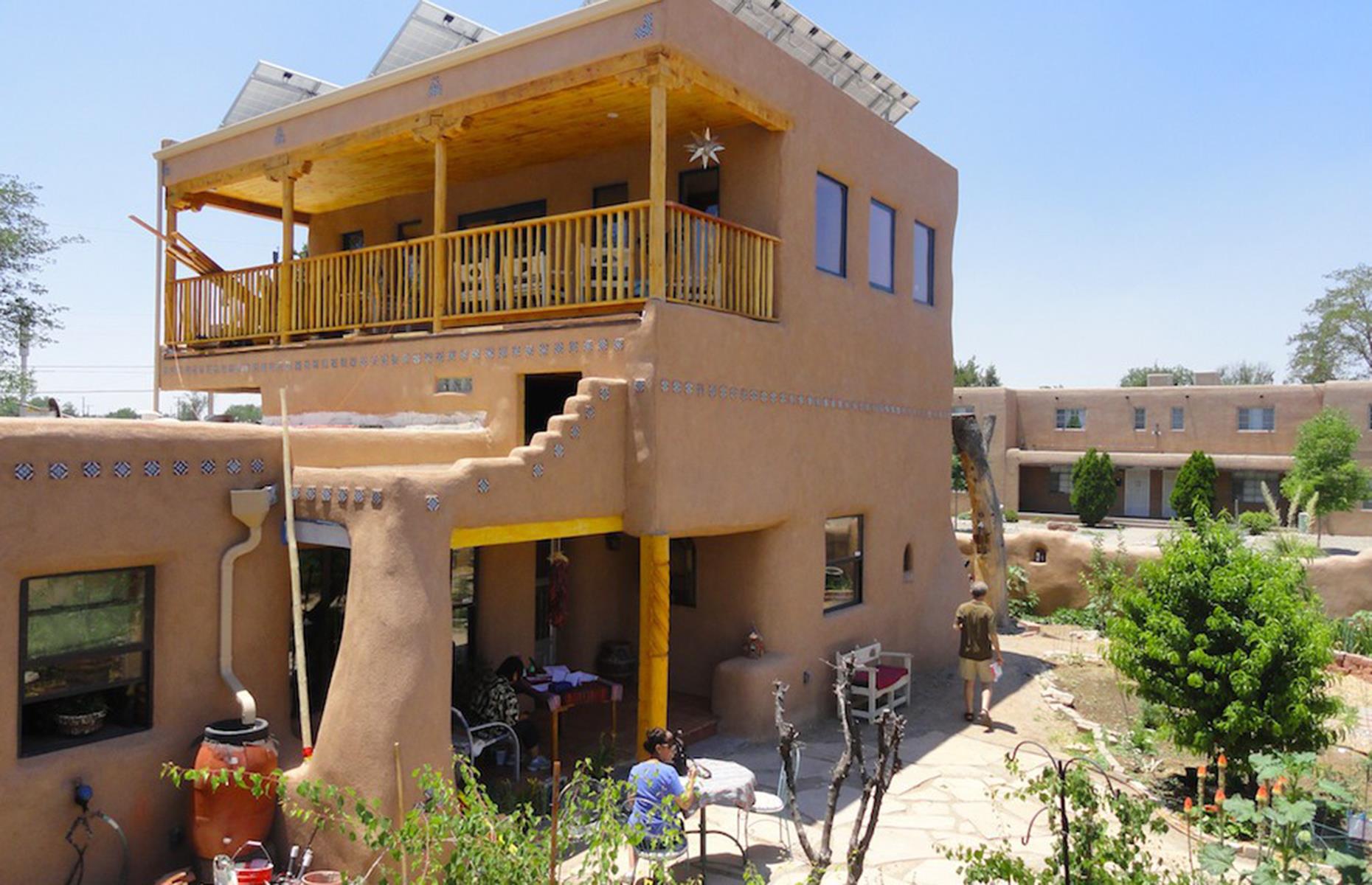 Pale pink straw bale house, New Mexico, USA